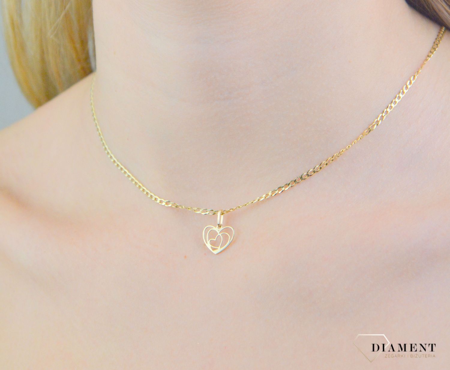 Zawieszka złota serce próba 585, ZA 6750 585, Zawieszka złota serce próba 585, ZA 6750 585. Zawieszka wykonana z żółtego 14 karatowego złota o formie serca. Idealny pomysł na prezent..jpg